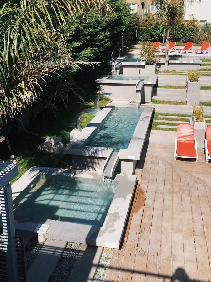 Aparthotel Aguas De Oro à Villa Gesell Extérieur photo