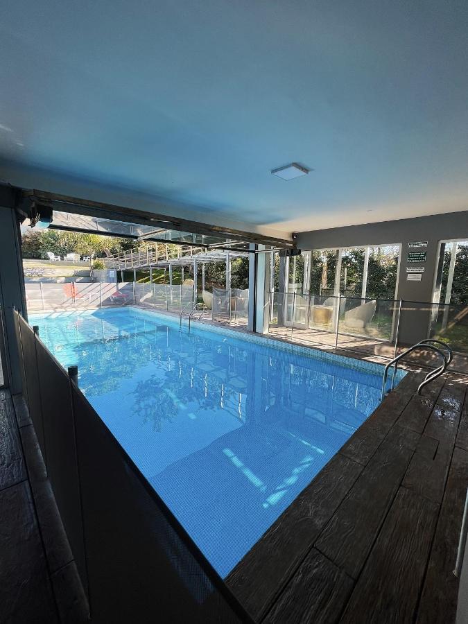 Aparthotel Aguas De Oro à Villa Gesell Extérieur photo